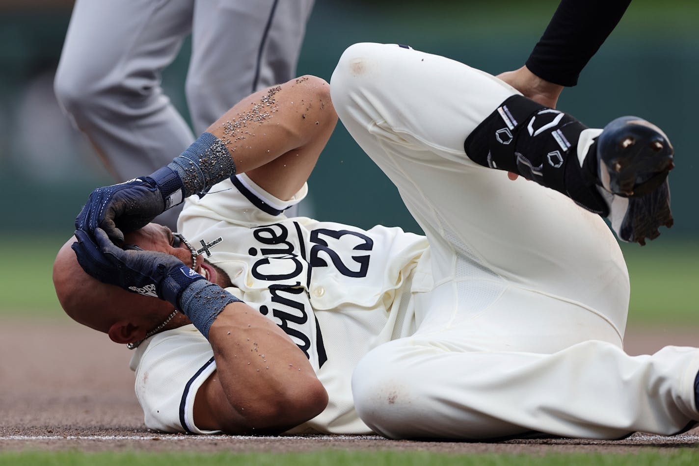 Minnesota Twins' Royce Lewis reacts after colliding with Cleveland Guardians first baseman Gabriel Arias during the eighth inning of a baseball game, Sunday, June 4, 2023, in Minneapolis. (AP Photo/Stacy Bengs)