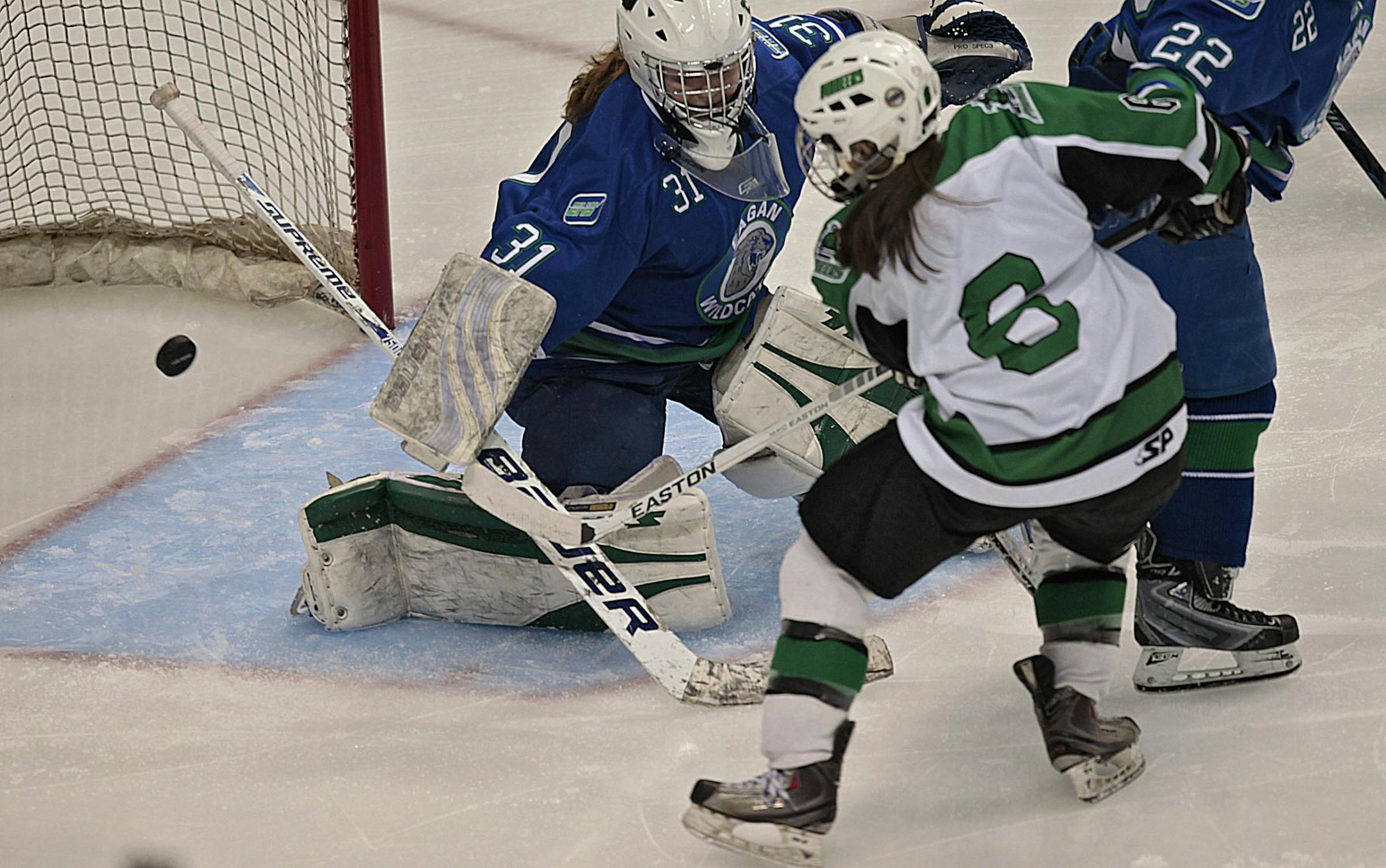 Eagan goaltender Sophia Lundquist made a third period save against Hill-Murray's Kennedy Houge.