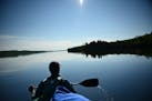 Paddling in the bow of a canoe while on Gunflint Lake during a BWCA trip last July.