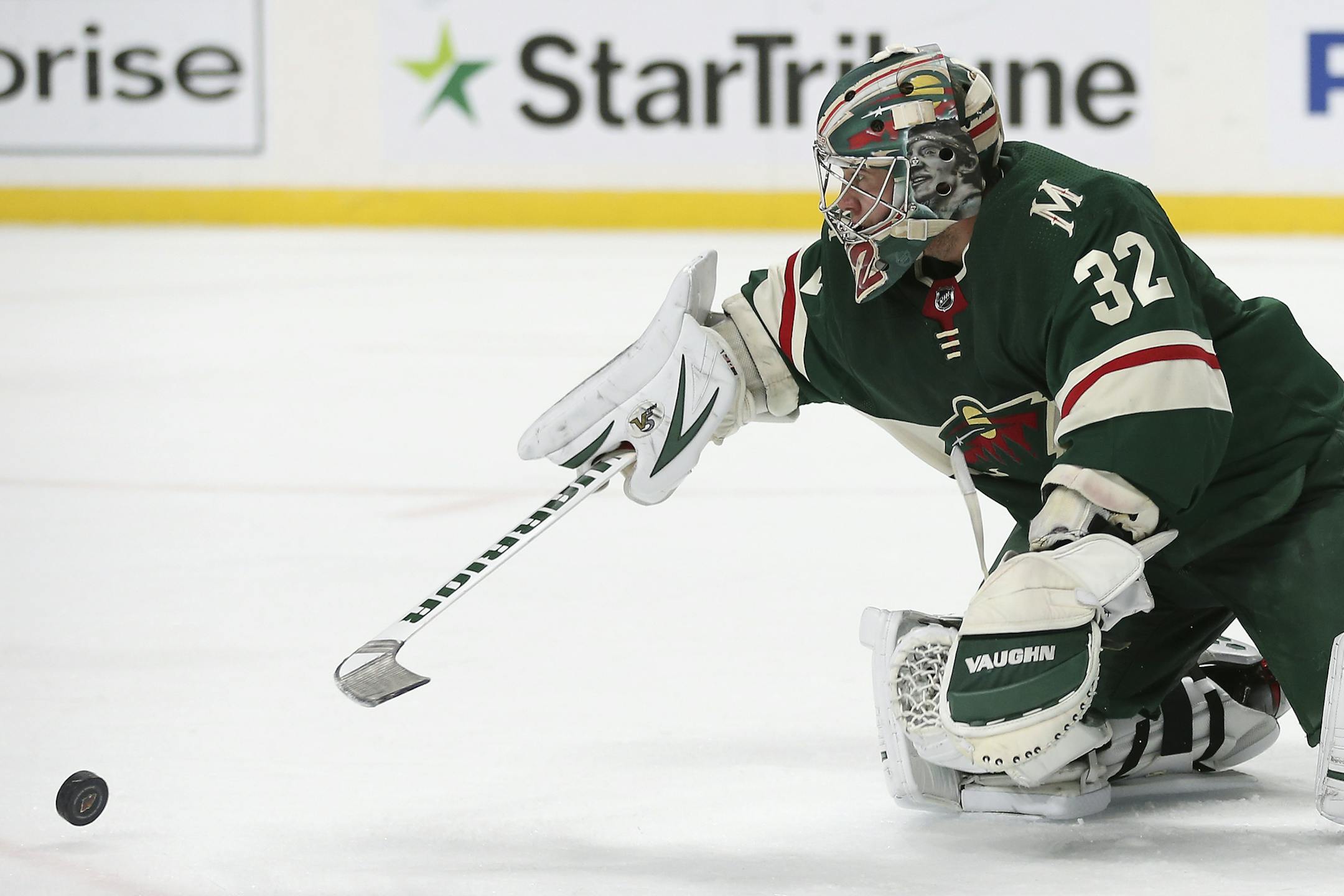 Minnesota Wild's goalie Alex Stalock blocks a shot attempt by the Philadelphia Flyers in the second period of an NHL hockey game Saturday Dec. 14, 2019, in St. Paul, Minn. (AP Photo/Stacy Bengs)