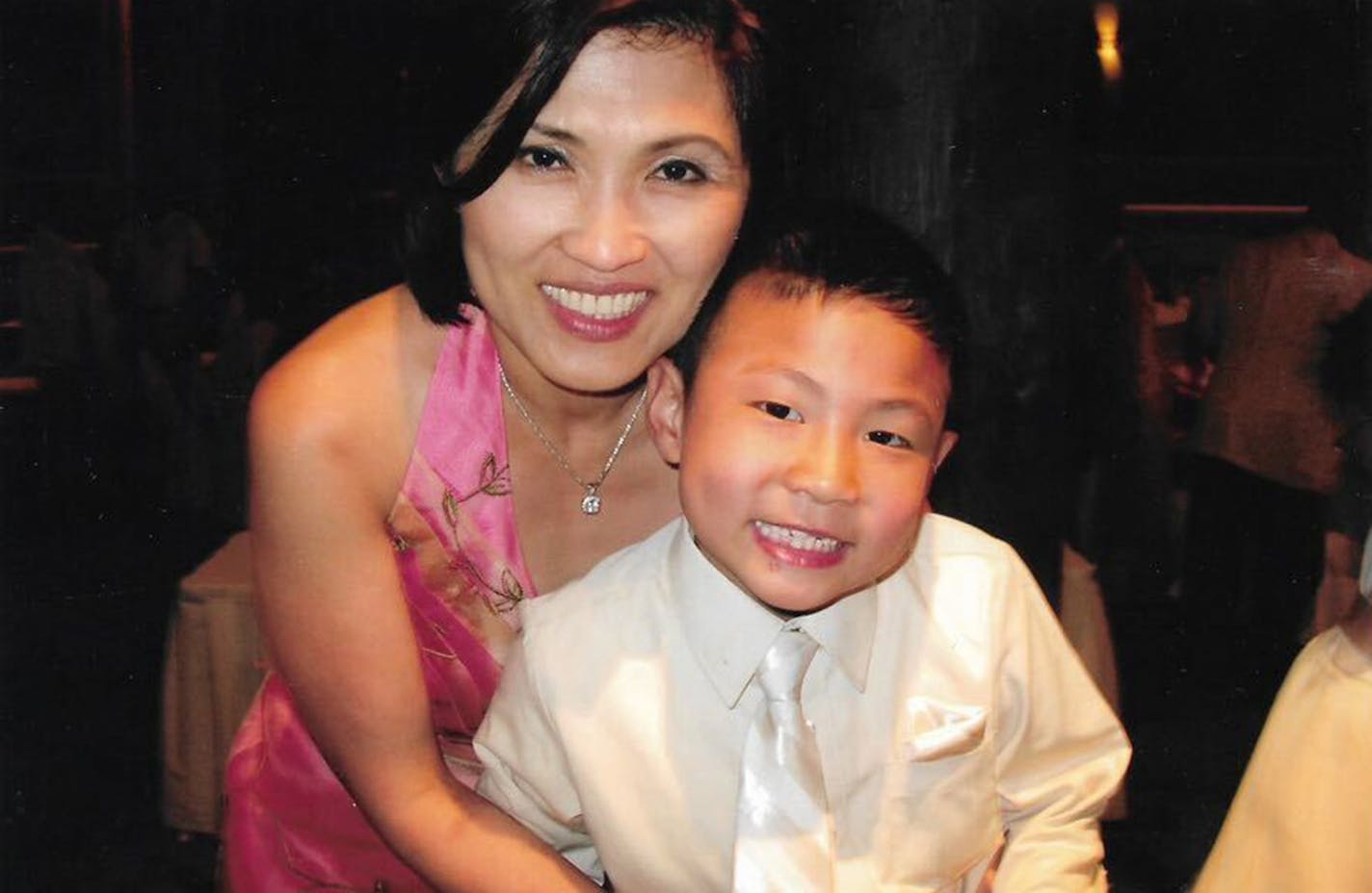 A family photo of mother and son restaurateurs Khue and Eric Pham.