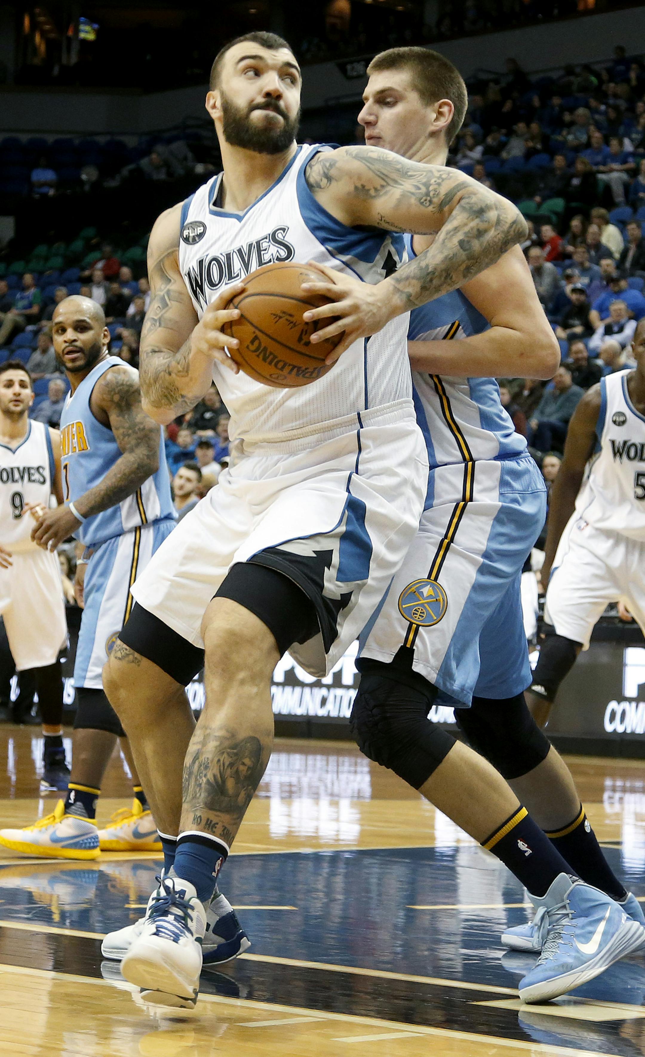 Timberwolves Nikola Pekovic (14) fought for position in the first quarter. ] CARLOS GONZALEZ &#xef; cgonzalez@startribune.com - January 6, 2016, Minneapolis, MN, Target Center, NBA, Minnesota Timberwolves vs. Denver Nuggets
