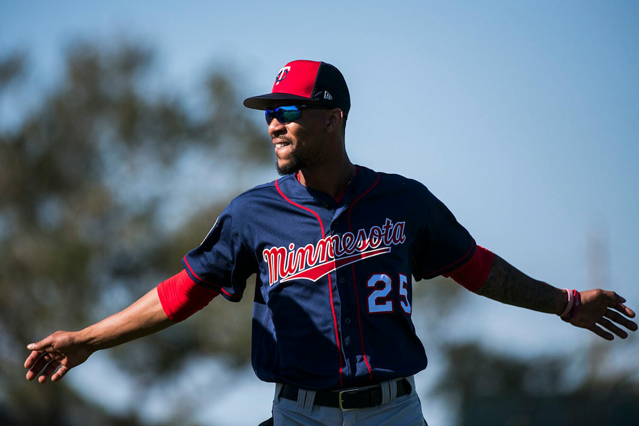 Twins outfielder Byron Buxton (25) stretched before workouts.
