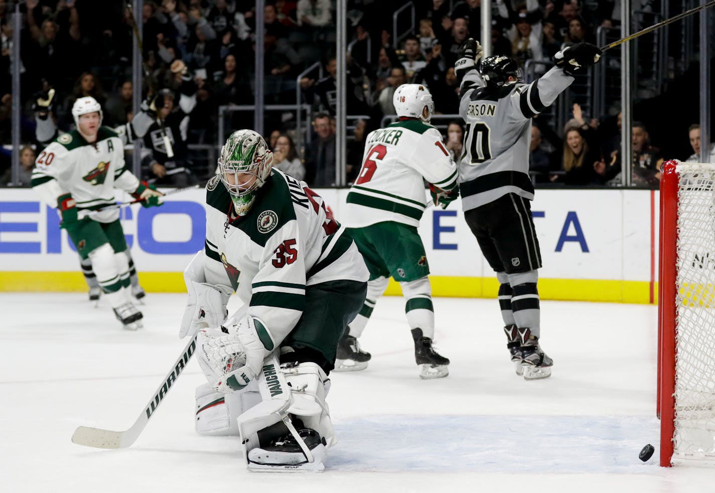 Minnesota Wild goalie Darcy Kuemper reacts after Los Angeles Kings left wing Tanner Pearson scored the game winning goal during overtime in an NHL hockey game in Los Angeles, Saturday, Jan. 7, 2017. The Kings won 4-3 in overtime. (AP Photo/Chris Carlson)