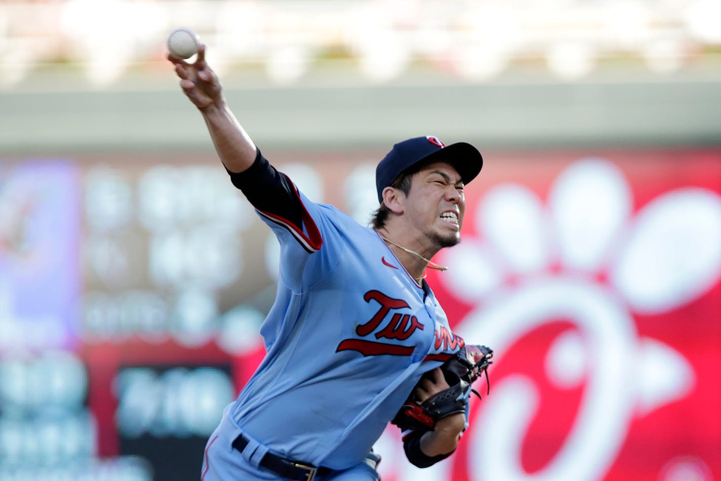 Minnesota Twins starting pitcher Kenta Maeda throws against the Tampa Bay Rays in the first inning of a baseball game, Saturday, Aug. 14, 2021, in Minneapolis. (AP Photo/Andy Clayton-King)