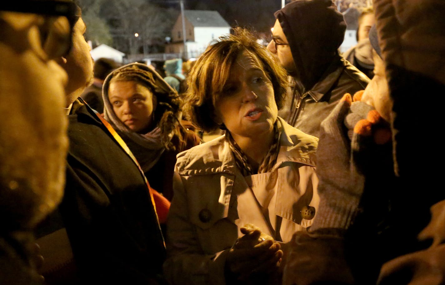 Protesters outside the Fourth Precinct station on Thursday night peppered Minneapolis Mayor Betsy Hodges with questions about police violence.