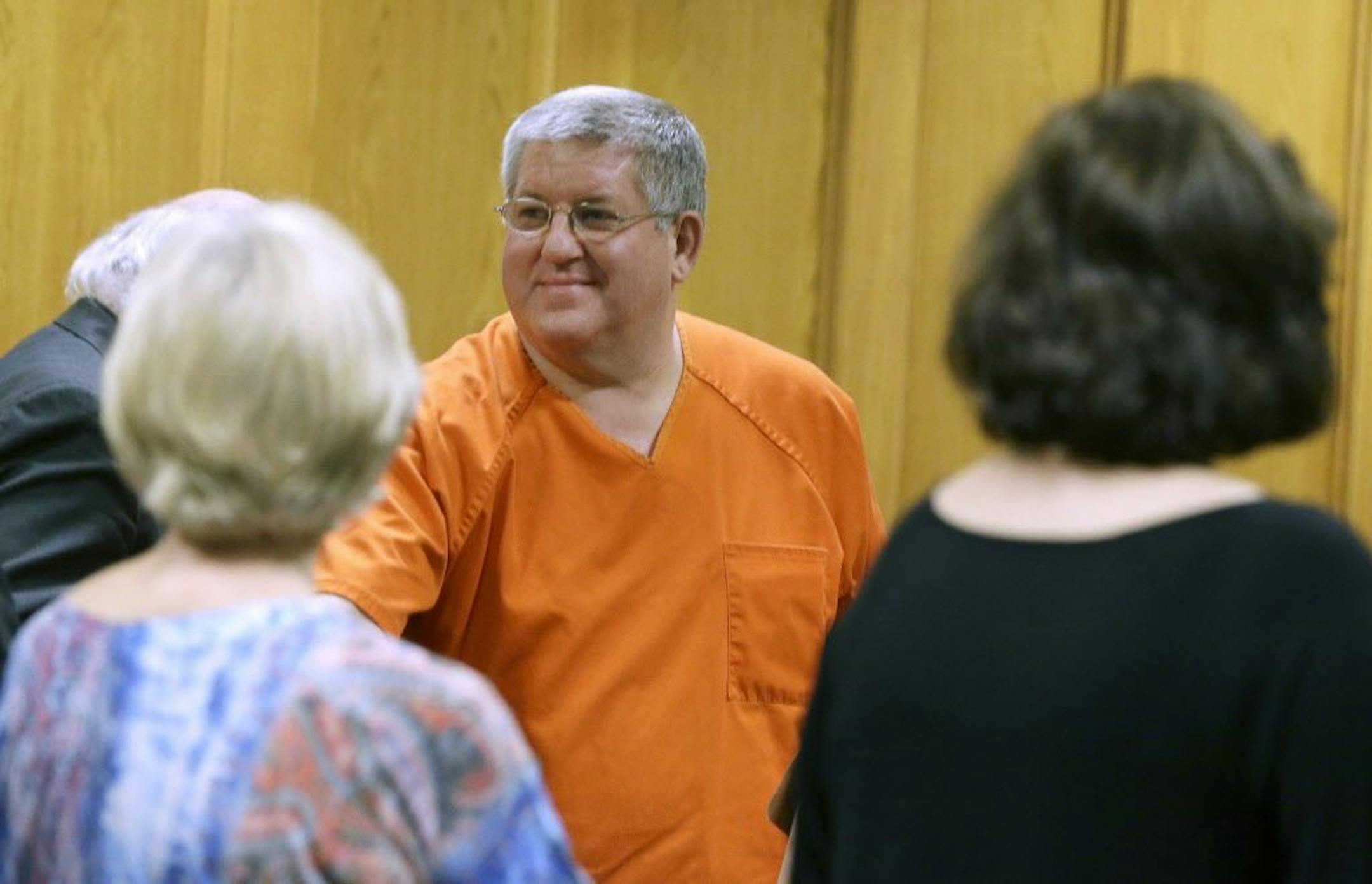 FILE- In this May 6, 2014, file photo, Bernie Tiede smiles after a court hearing granting his release at the Panola County court house in Carthage, Texas. Tiede had been sentenced to life for killing 81-year-old widow Marjorie Nugent for her fortune. Tiede now faces a new sentencing in the case that inspired the dark comedy "Bernie."
