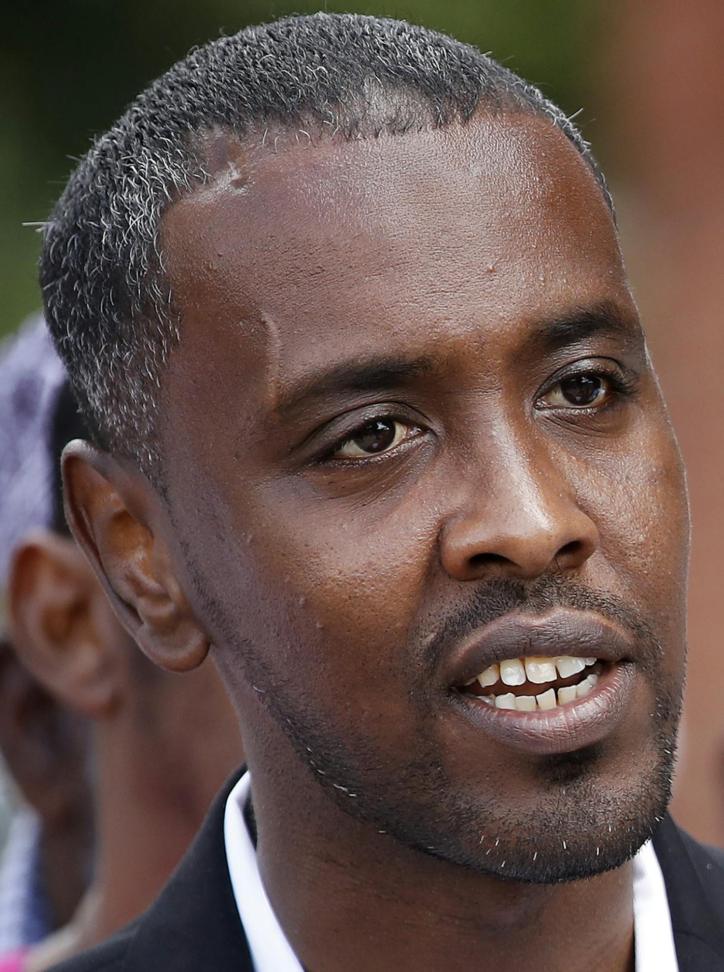 Minneapolis City Council Member Abdi Warsame held a press conference at the Darul Quba Cultural Center on Sunday. ] CARLOS GONZALEZ &#xef; cgonzalez@startribune.com - July 23, 2017, Minneapolis, MN, Minneapolis City Council Member Abdi Warsame talks about the Damond shooting, along with members of the East African community.