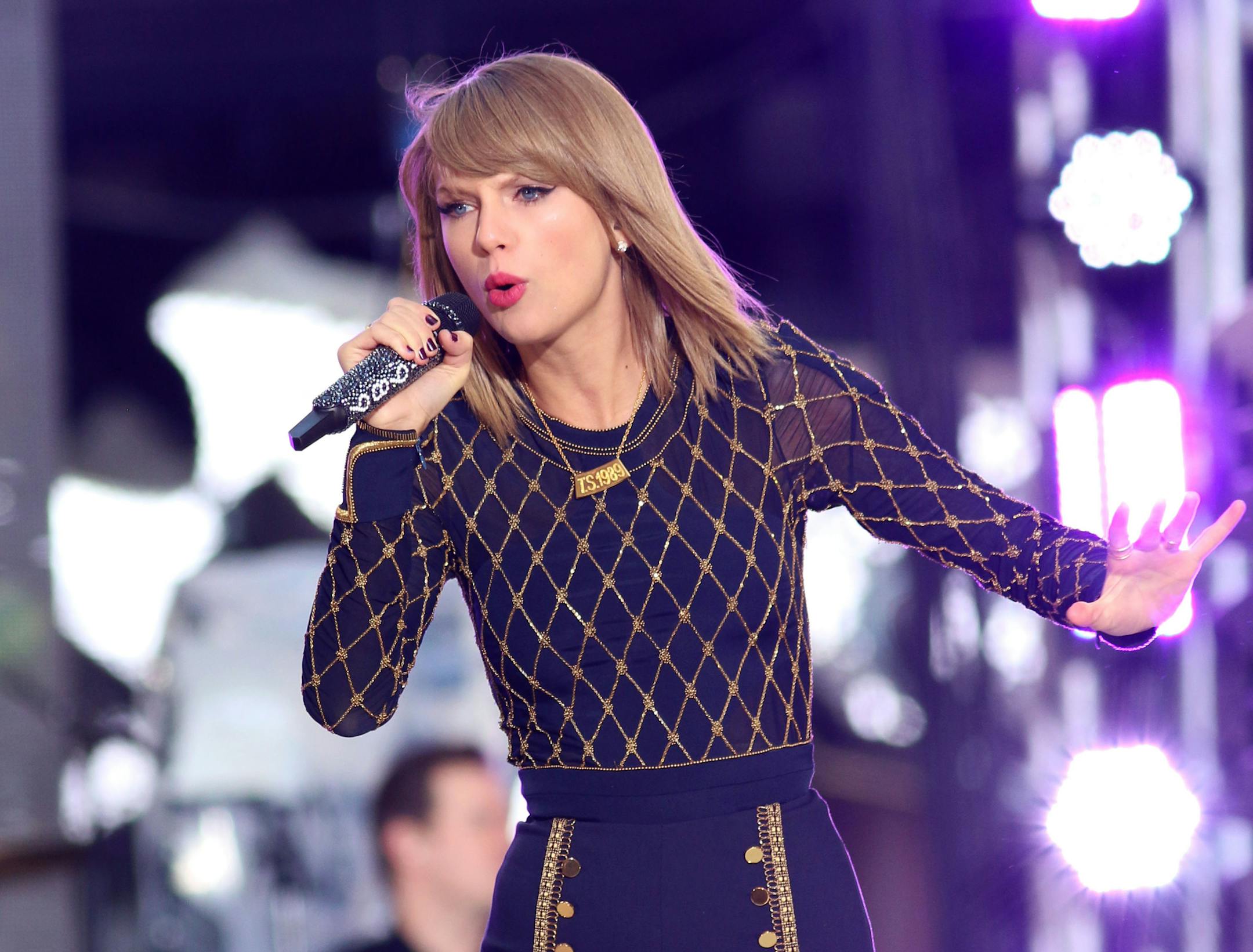 FILE - In this Oct. 30, 2014 file photo, Taylor Swift performs on ABC's "Good Morning America" in Times Square in New York. The music industry tracker says it's transforming the Billboard 200 chart from a sales-based ranking to one that better measures music consumption. This move comes after music acts like Swift and Jason Aldean pulled their tunes from Spotify. (Photo by Greg Allen/Invision/AP, File)