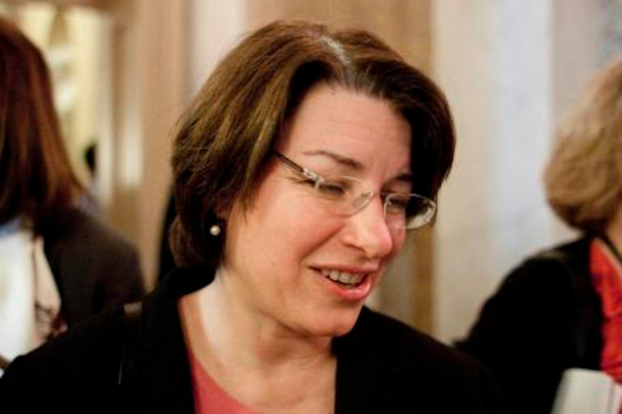 Sen. Amy Klobuchar, D-Minn.,  speaks to reporters after the weekly caucus luncheons on Capitol Hill in Washington, Tuesday, March 2, 2010. (AP Photo/Harry Hamburg)