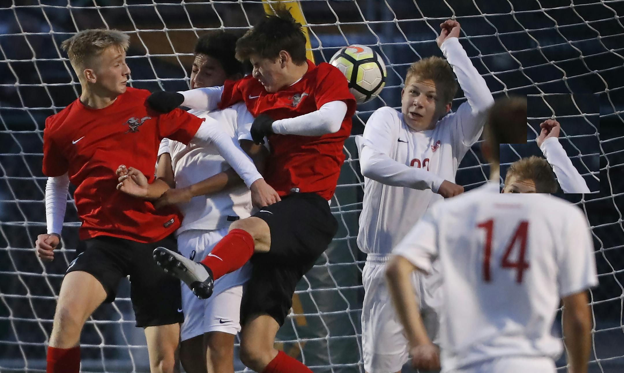 Duluth East gets the balll past goalie Richard Hemric(1) to go up 2-1.] Class 2A boys' soccer quarterfinals,Duluth East vs. Centennial. Richard Tsong-TaatariiïRichard.Tsong-Taatarii@startribune.com.
