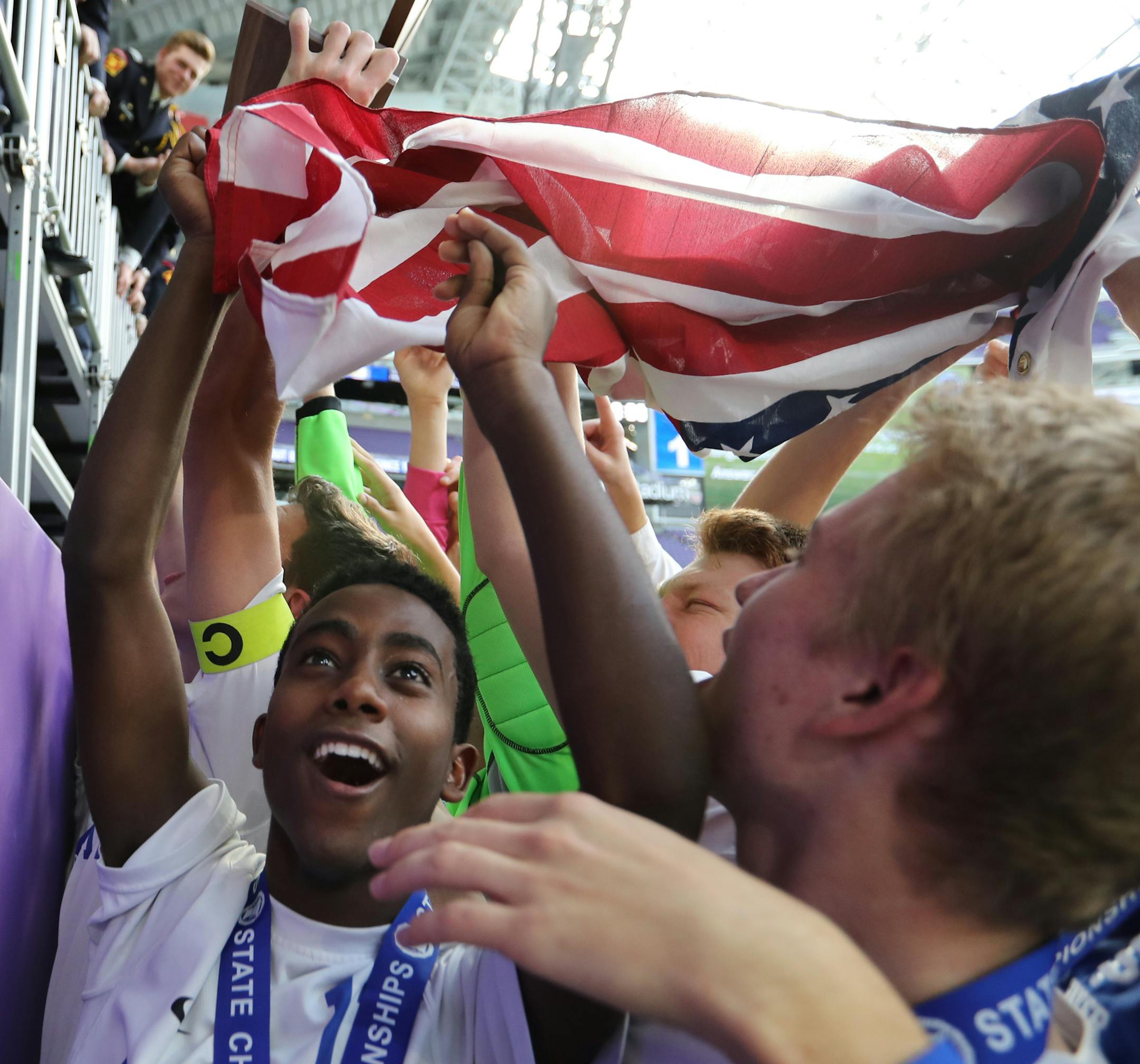 Northfield Academy players celebrate their win. ] (Leila Navidi/Star Tribune) leila.navidi@startribune.com BACKGROUND INFORMATION: Class 1A boys soccer championships between Northfield and St. Thomas Academy at U.S. Bank Stadium in Minneapolis on Thursday, November 3, 2016. St. Thomas Academy won 1-0 in overtime on a penalty kick that was awarded after a foul.