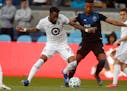 The San Jose Earthquakes' Danny Hoesen (9), right, fought for the ball against Minnesota United FC's Romain Métanire (19) in a match in March. Loons 