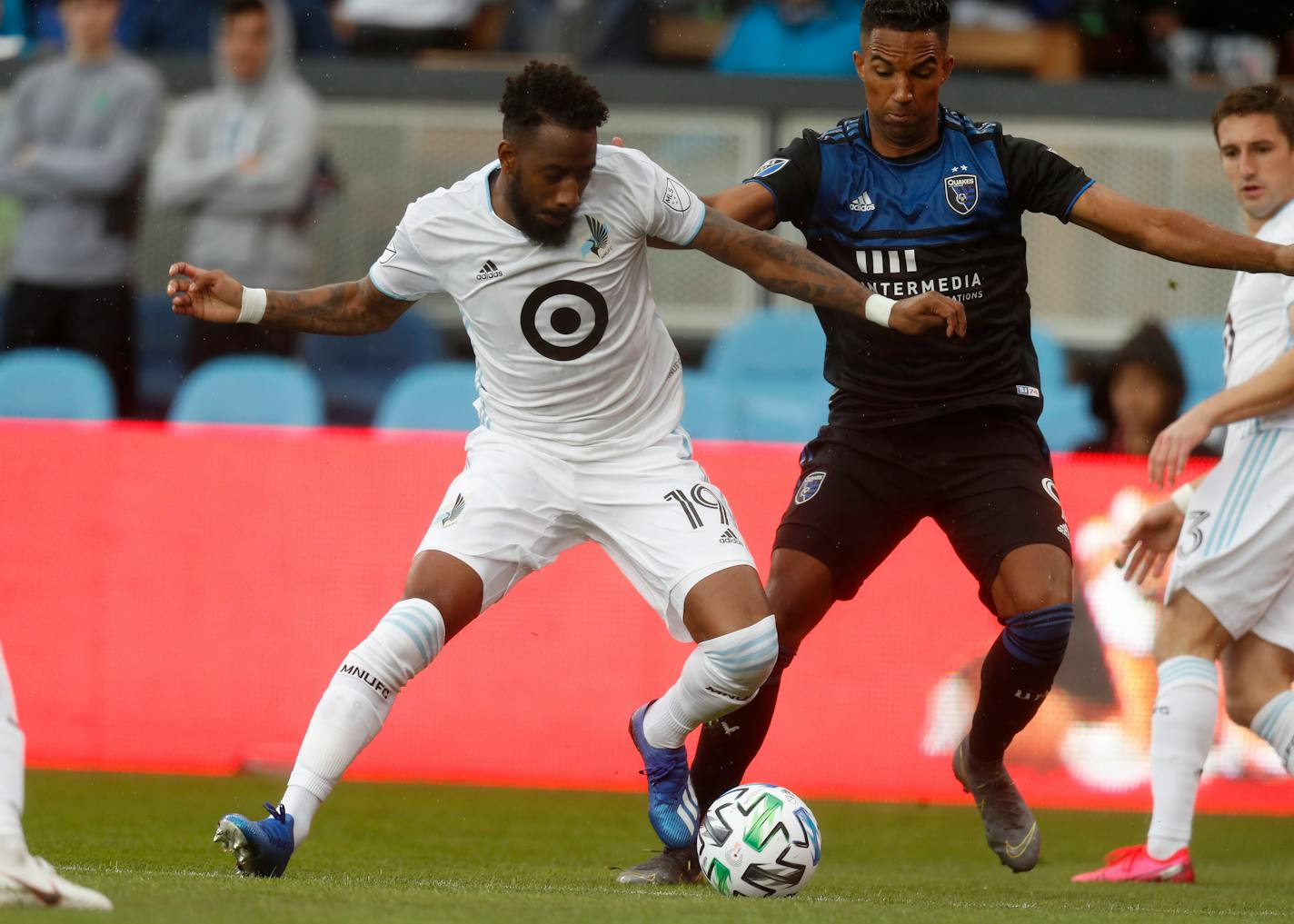 The San Jose Earthquakes' Danny Hoesen (9), right, fought for the ball against Minnesota United FC's Romain Métanire (19) in a match in March. Loons players will begin voluntary individual workouts outdoors at their Blaine training facility Tuesday, the team's first small step toward returning from its suspended season to full team training and presumably games.