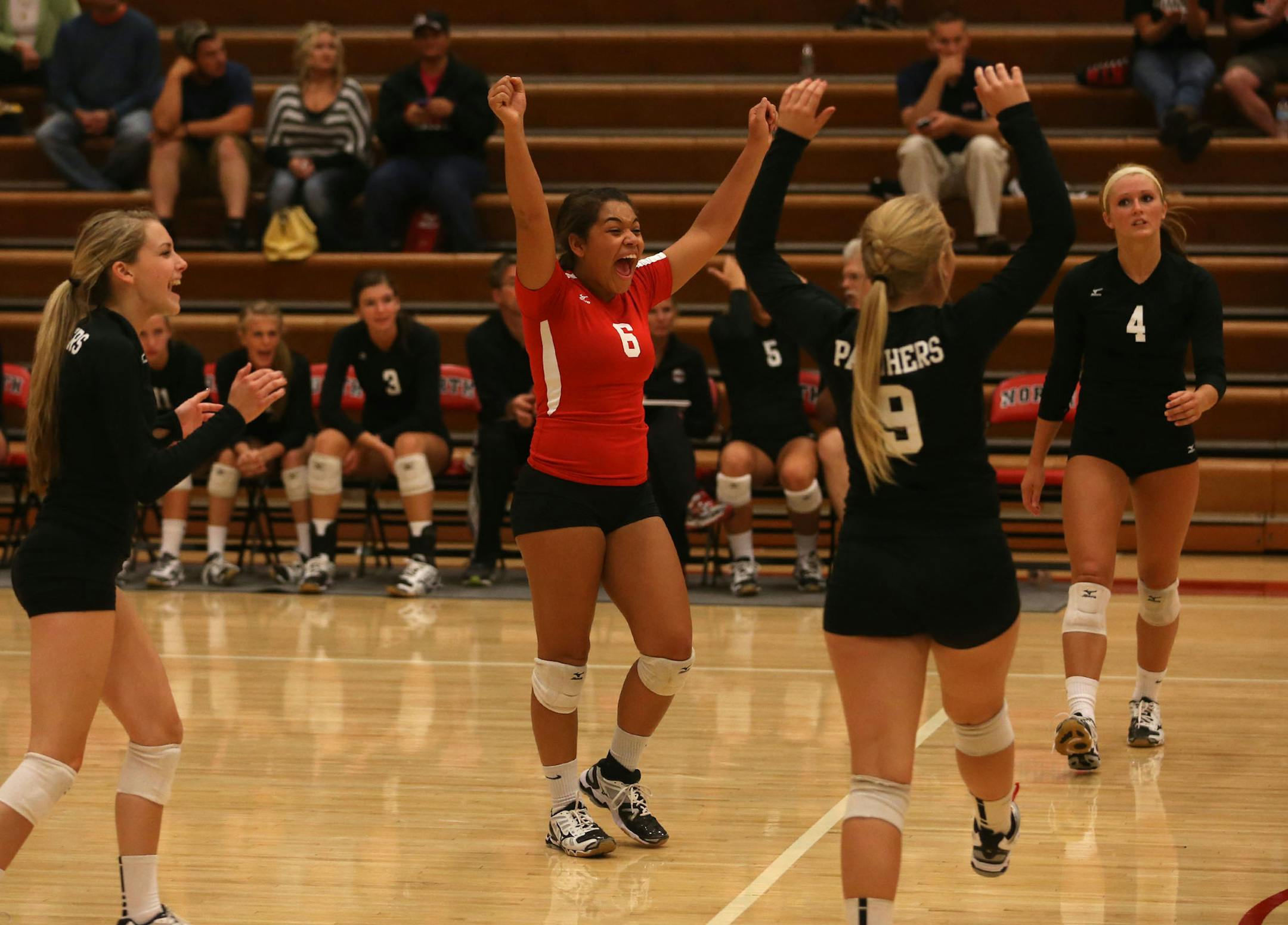 Lakeville North's Abby Monson celebrated a pointher teammates against Apple Valley in Lakeville Tuesday September 17, 2013. ] (KYNDELL HARKNESS/STAR TRIBUNE) kyndell.harkness@startribune.comLakeville North's Abby Monson celebrated a point with her teammates against Apple Valley in Lakeville Tuesday September 17, 2013. ] (KYNDELL HARKNESS/STAR TRIBUNE) kyndell.harkness@startribune.com