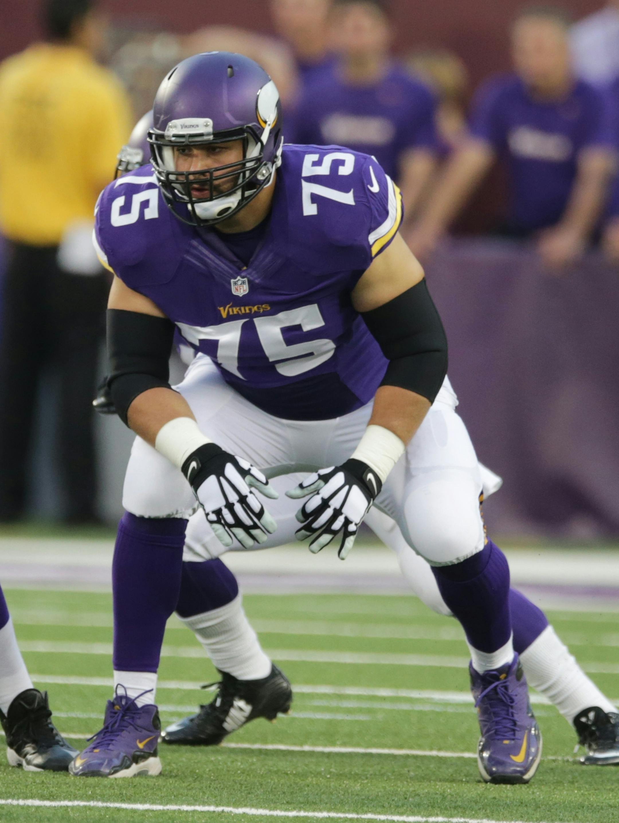 Minnesota Vikings tackle Matt Kalil (75) gets set at the line of scrimmage during the first half of an NFL preseason football game against the Arizona Cardinals, Saturday, Aug. 16, 2014, in Minneapolis. (AP Photo/Jim Mone)