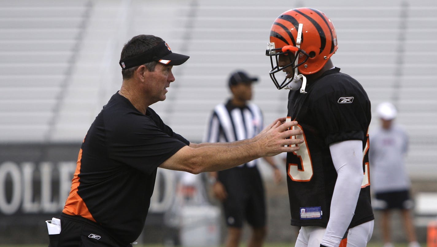 Cincinnati Bengals' defensive coordinator Mike Zimmer works with cornerback Leon Hall (29) during practice at NFL football training camp, Friday, Aug. 5, 2011 in Georgetown, Ky. (AP Photo/Al Behrman) ORG XMIT: NYEOTK