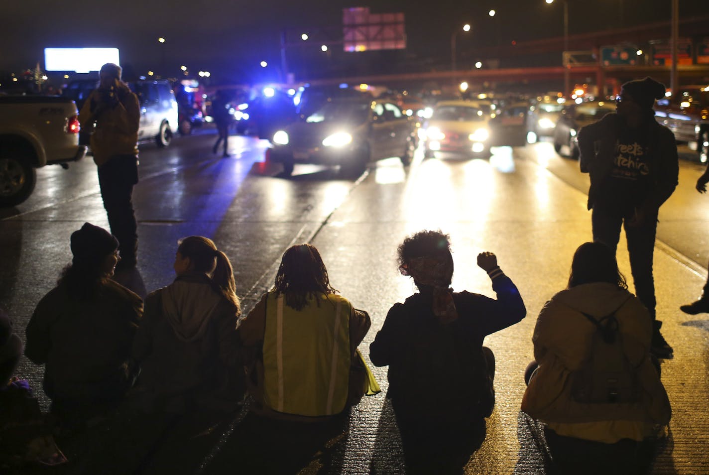 Protesters shut down the northbound lanes of Interstate 94 south of Broadway on Monday night where they linked arms and blocked traffic lanes for more than two hours.