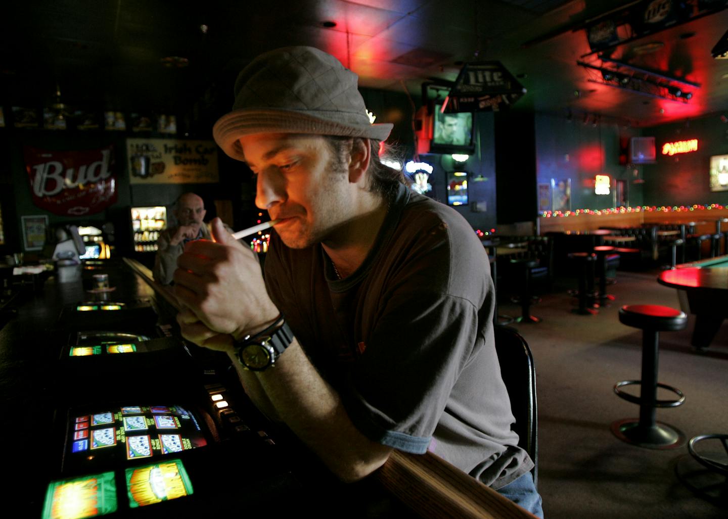 Las Vegas resident and musician Chad Madix lights a cigarette at the Favorites bar in Las Vegas on Wednesday, Feb. 7, 2007.