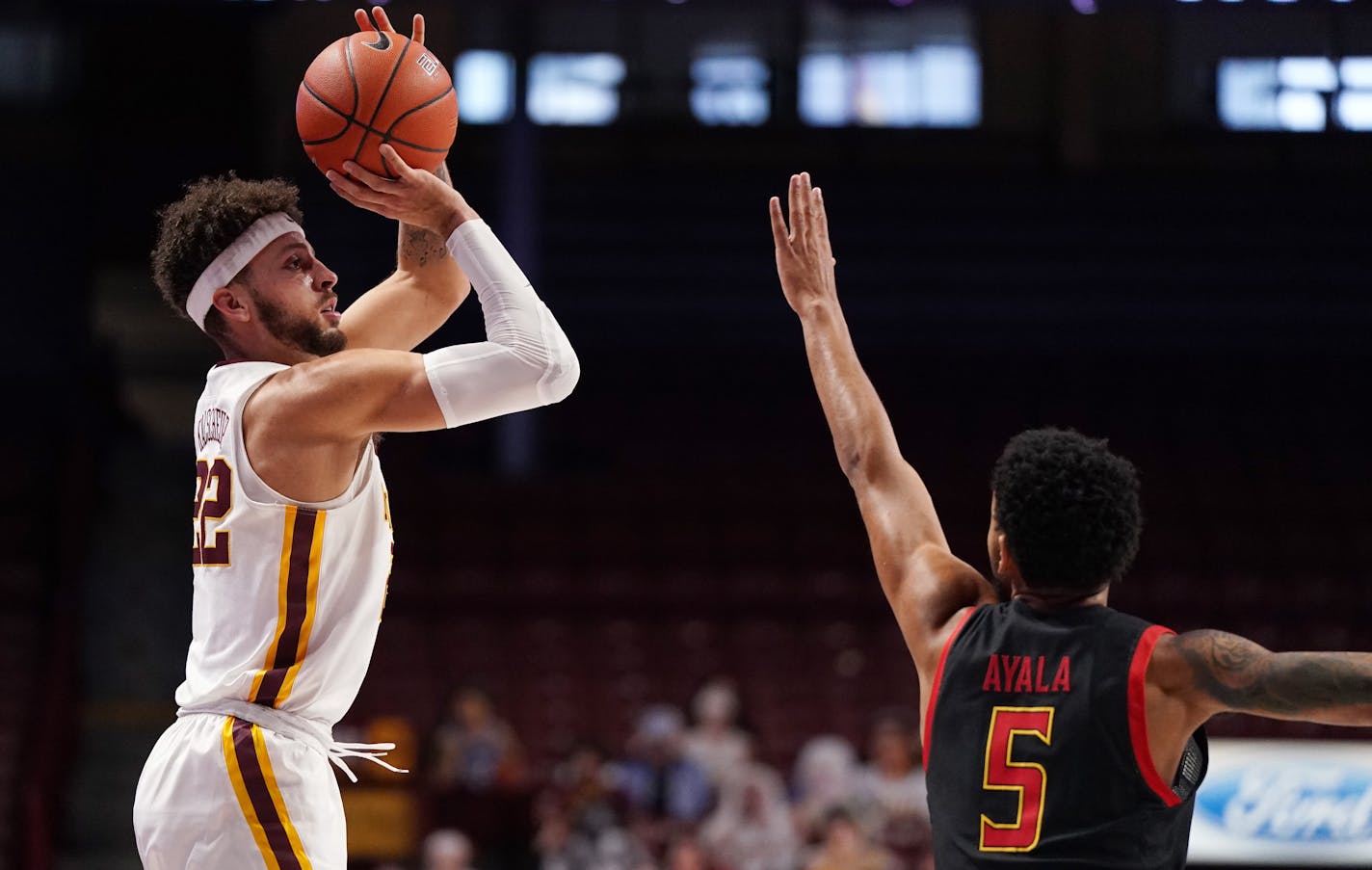 Minnesota guard Gabe Kalscheur (22) took an outside shot as Maryland guard Eric Ayala (5) reached to block in the first half. ] ANTHONY SOUFFLE • anthony.souffle@startribune.com