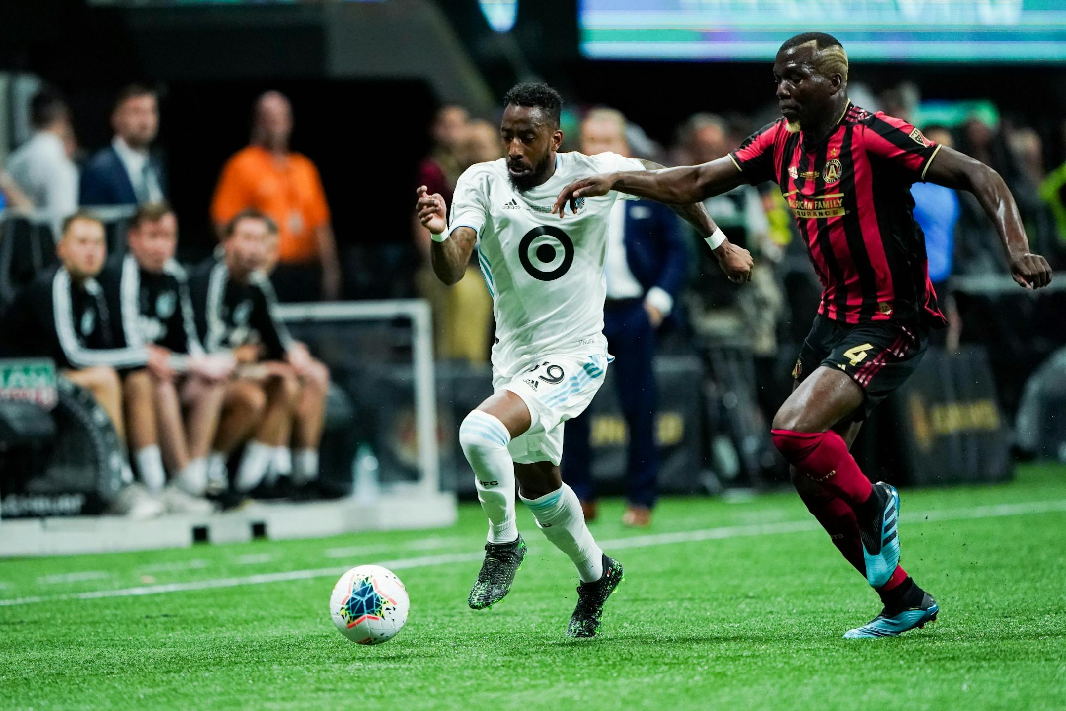 Minnesota United defender Romain Metanire (19) and Atlanta United defender Florentin Pogba (4) during the U.S. Open Cup at Mercedes-Benz Stadium in Atlanta on Tuesday, Aug. 27, 2019. Photo by Kevin D. Liles for the Star Tribune