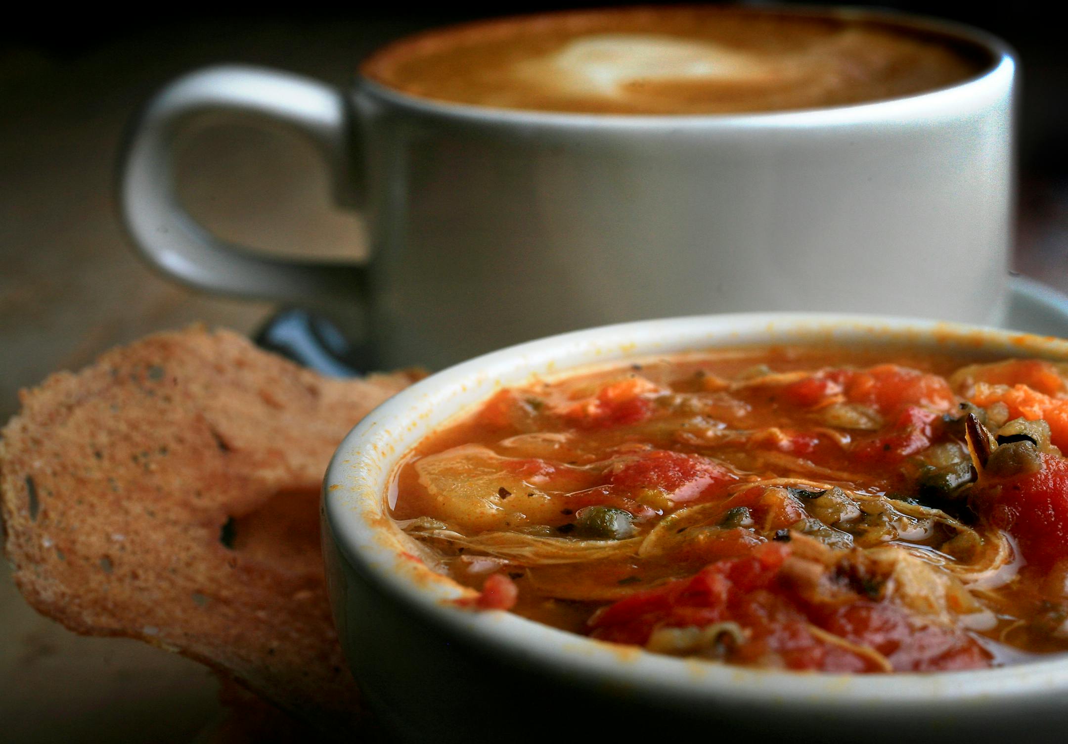 On a cold winter afternoon one of the soups that the Common Roots Cafe serves is chicken and wild rice soup with potatoes, basil, sweet potatoes, Minnesota wild rice, tomatoes, local free-range chicken, caramelized shallots and Wisconsin crimini mushrooms.