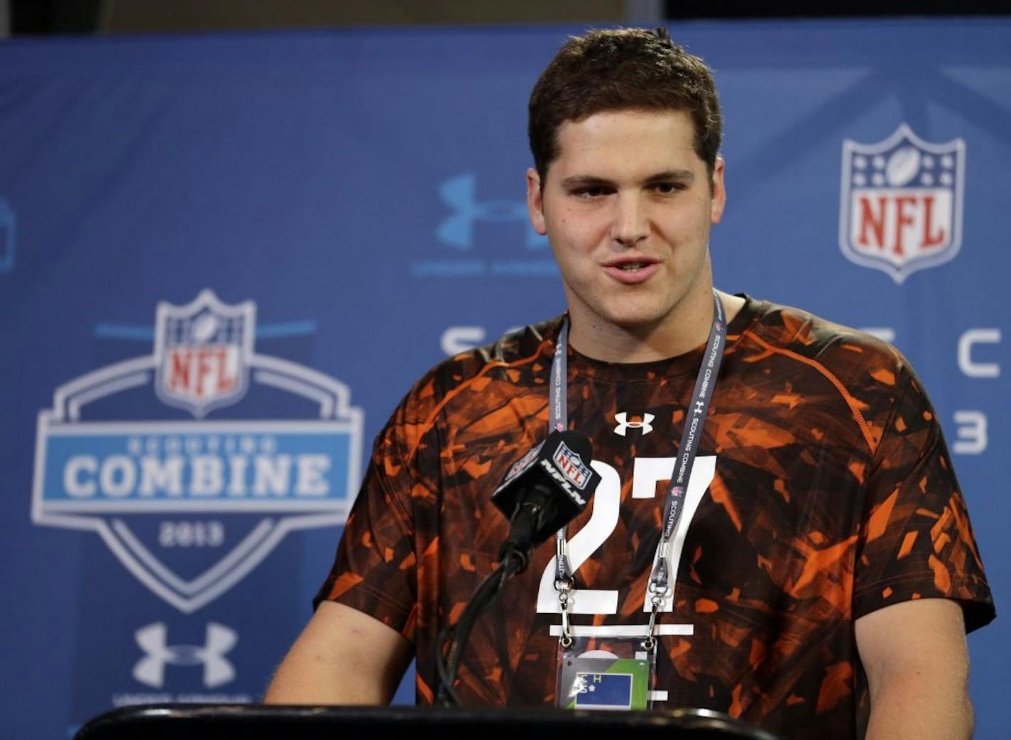 Texas A&M offensive lineman Luke Joeckel answers a question during a news conference at the NFL combine.