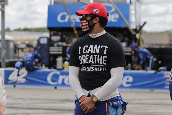 Bubba Wallace (43) wears a "I Can't Breath, Black Lives Matter" shirt before a NASCAR race earlier this month.
