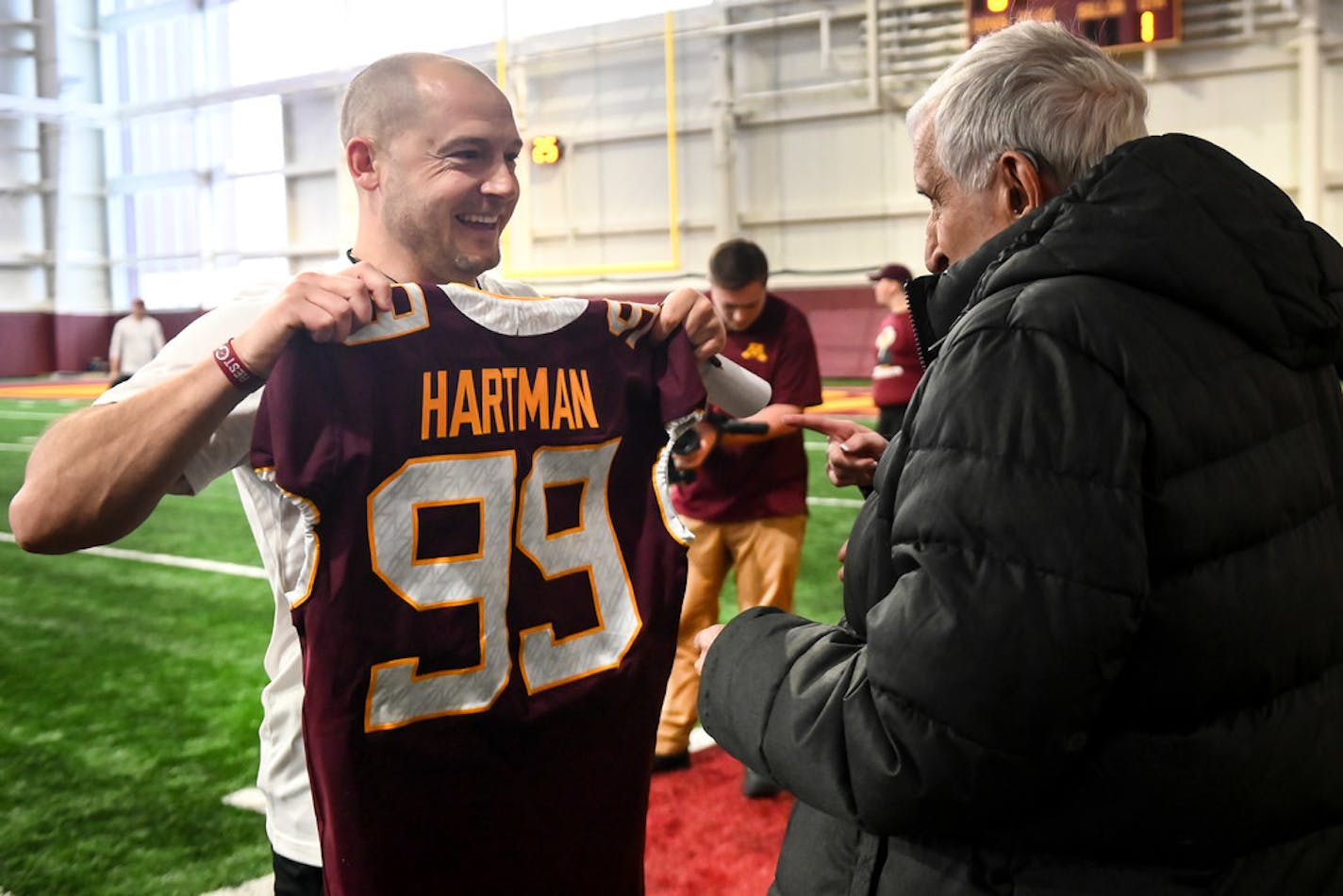 P.J. Fleck gave Sid Hartman a jersey for his 99th birthday in 2019.