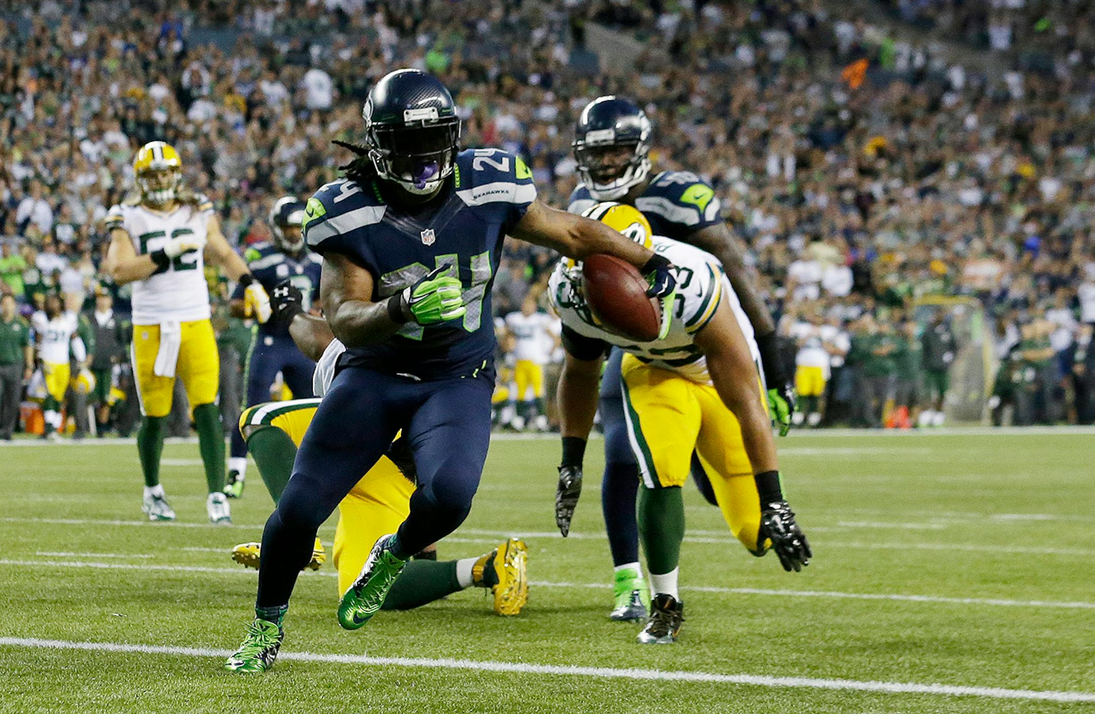 Seattle Seahawks running back Marshawn Lynch scores his second touchdown of the game against the Green Bay Packers during Thursday's NFL season opener. Lynch rushed 20 times for 110 yards in Seattle's 36-16 victory.