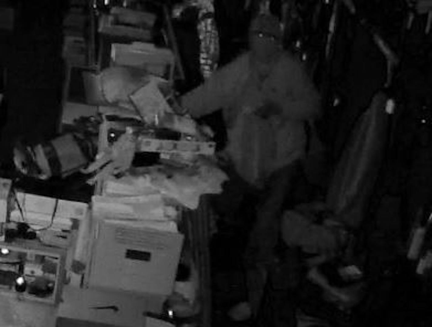 This interior image shows a suspected burglar inside a northern Wisconsin pawnshop.