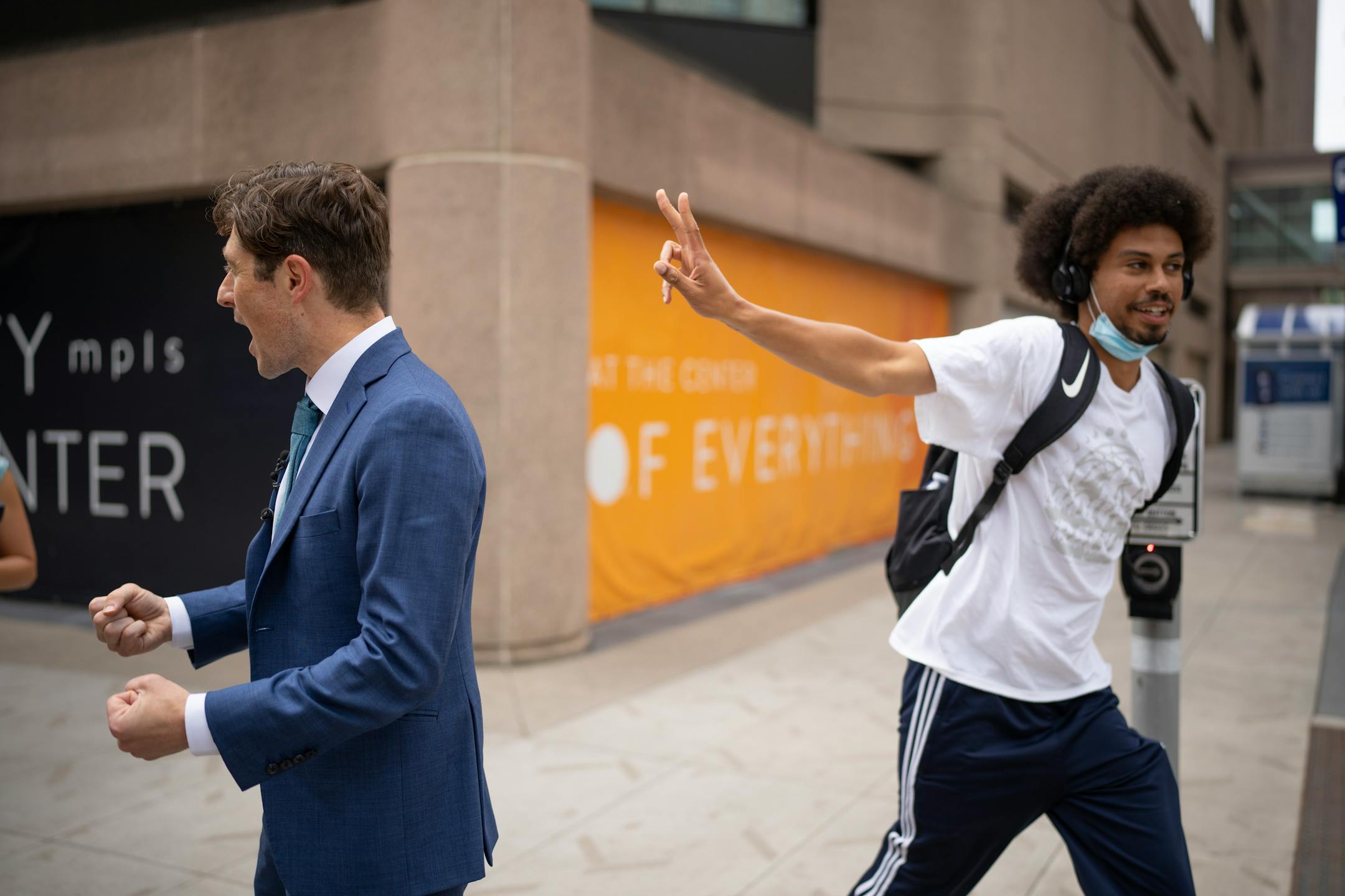 A young man photo bombed Minneapolis Mayor Jacob Frey as he led local media on a walking tour of a stretch of the Nicollet Mall that could see changes such becoming pedestrian-only. Before that he was joined at a news conference Tuesday, June 6, 2023 at Dayton's by members of his newly formed "Vibrant Downtown Storefronts Workgroup" to announce recommendations the group submitted to him.