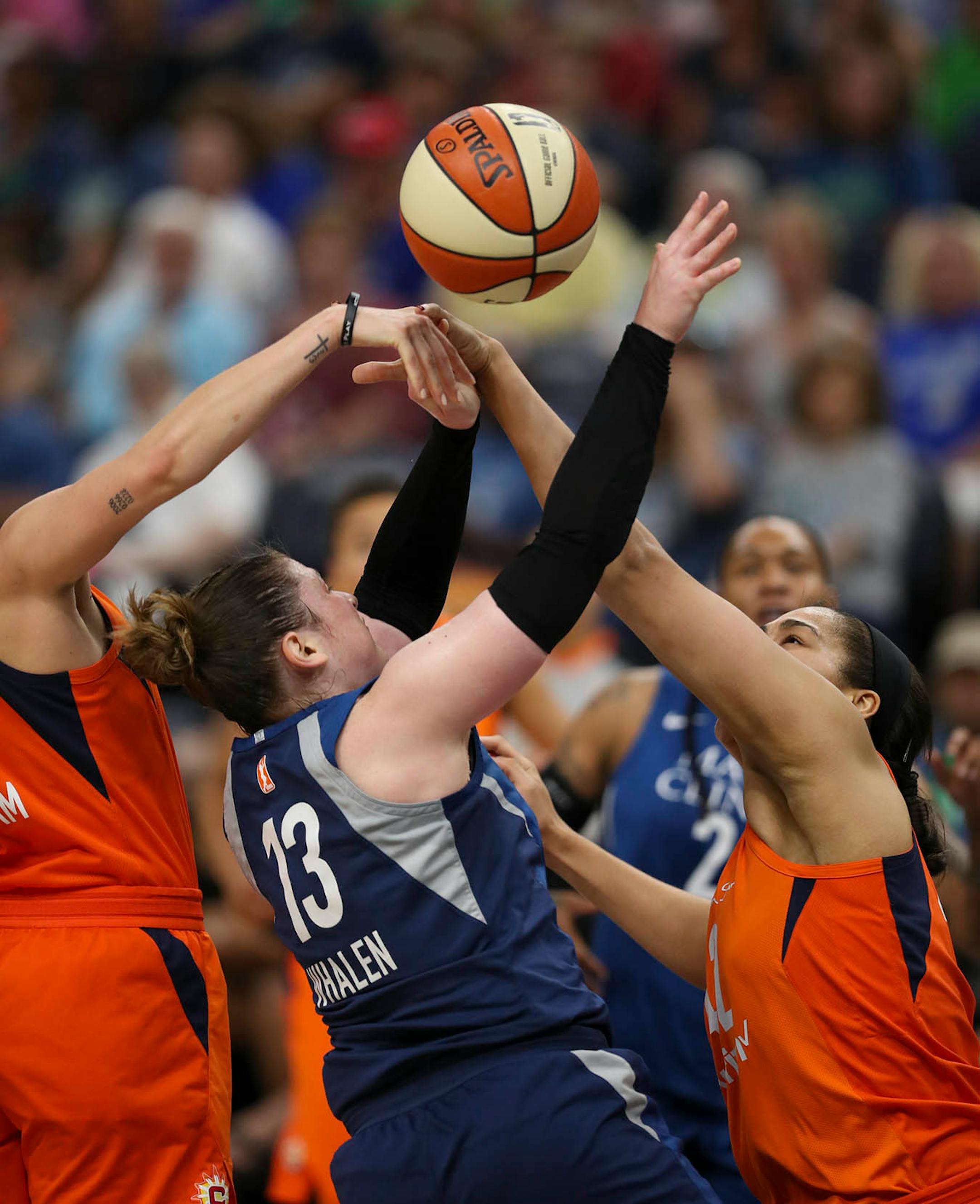 Minnesota Lynx guard Lindsay Whalen (13) was shut down while trying to shoot in the second quarter.