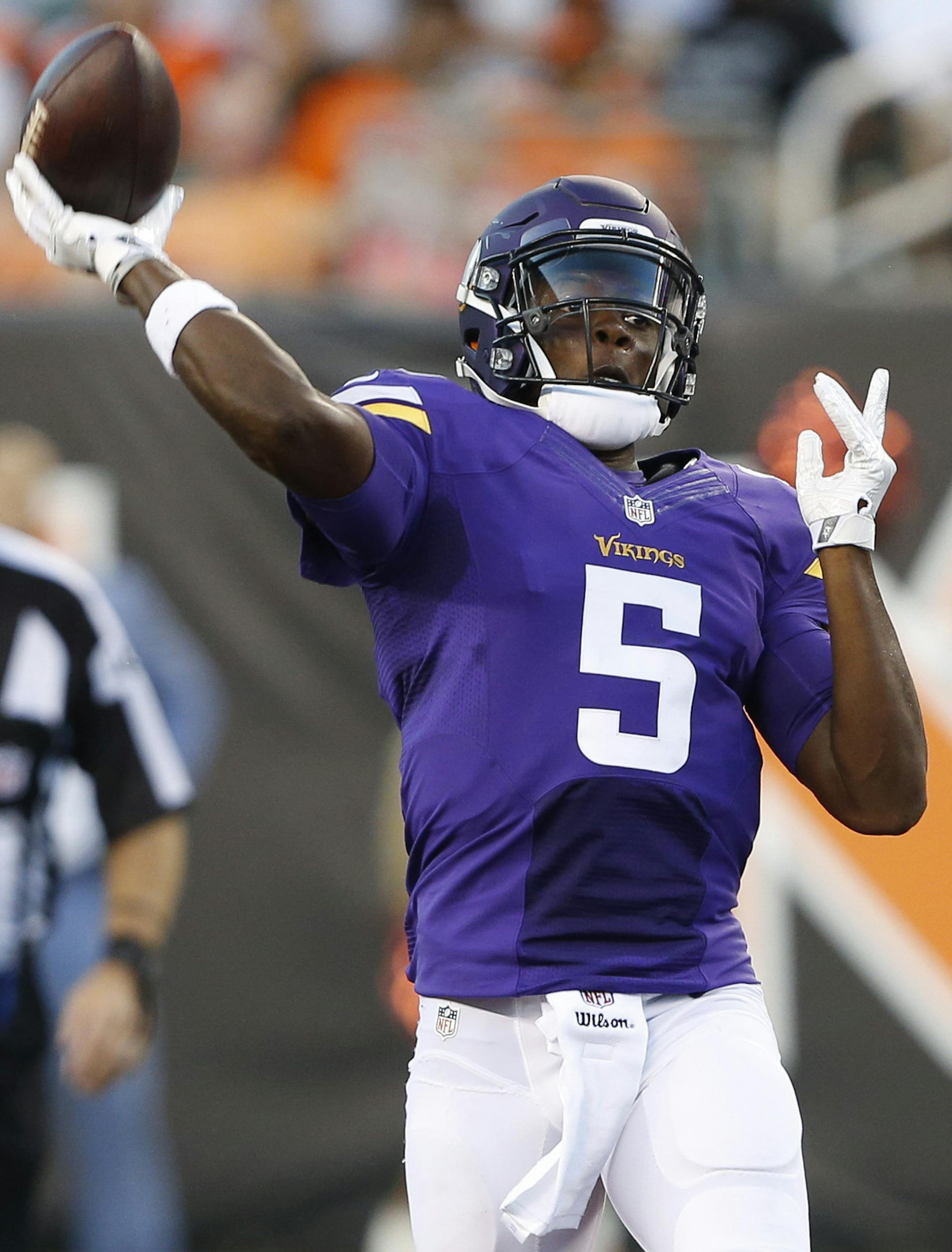 Minnesota Vikings quarterback Teddy Bridgewater (5) throws to wide receiver Charles Johnson for a touchdown during the first half of an NFL preseason football game against the Cincinnati Bengals, Friday, Aug. 12, 2016, in Cincinnati. (AP Photo/Frank Victores) ORG XMIT: MIN2016081221331297