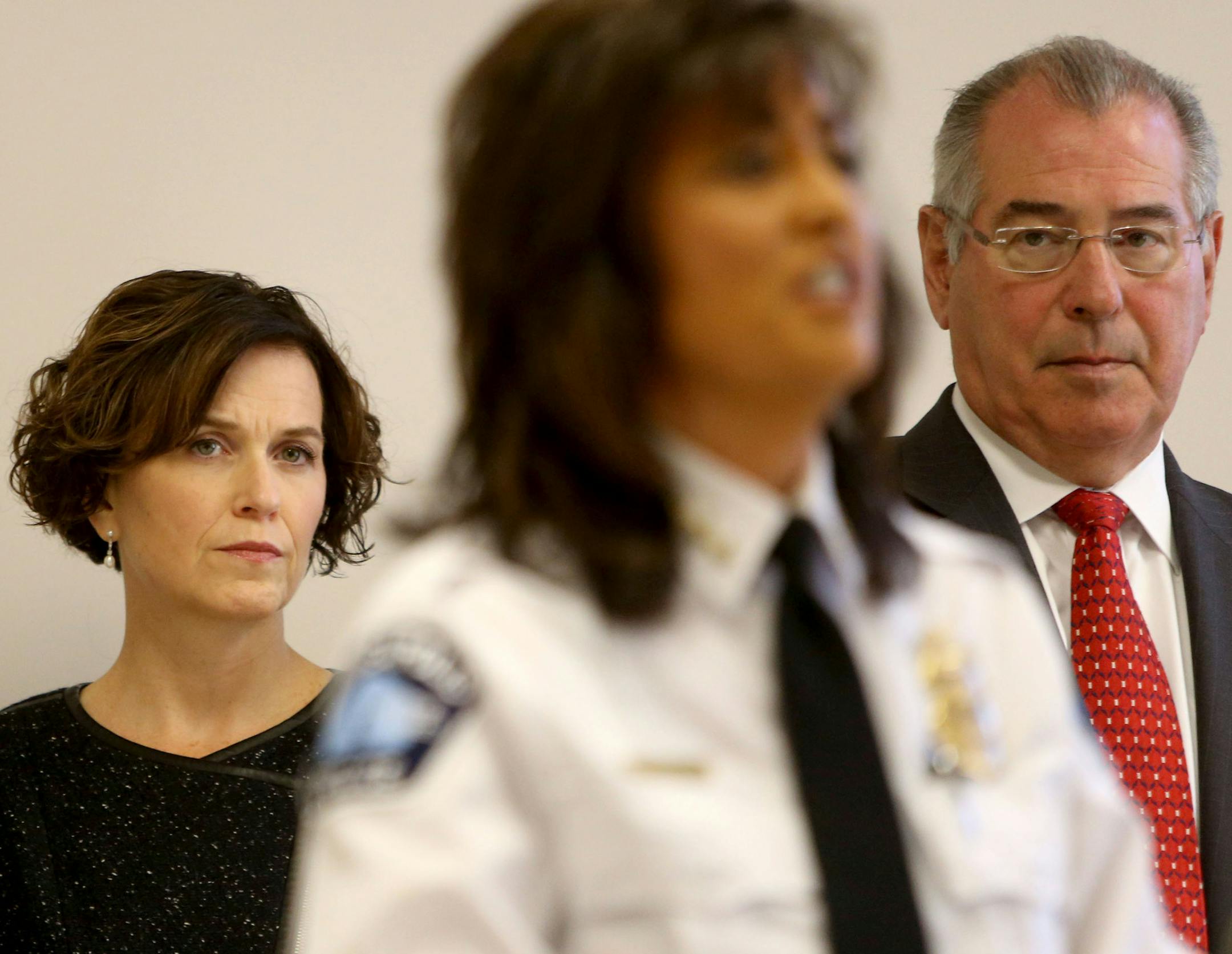 Minneapolis mayor Betsy Hodges, Minneapolis police chief Janee Harteau, and Hennepin County Attorney Mike Freeman held a press conference along with other officials at City Hall to discuss "new focused interventions around violent crime," Friday, Nov. 13, 2015, in Minneapolis, MN. As Harteau addresses the media, Hodges, left, and Freeman look on.](DAVID JOLES/STARTRIBUNE)djoles@startribune.com Mayor Betsy Hodges, Chief Janee Harteau, County Attorney Mike Freeman held a press conference along wit