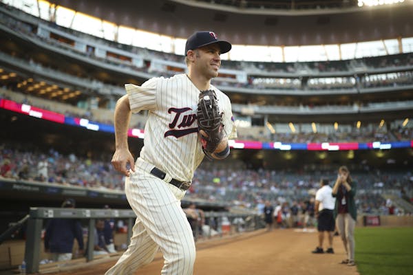 Minnesota Twins first baseman Joe Mauer trotted onto thy4 field for the start of the game against the Yankees.