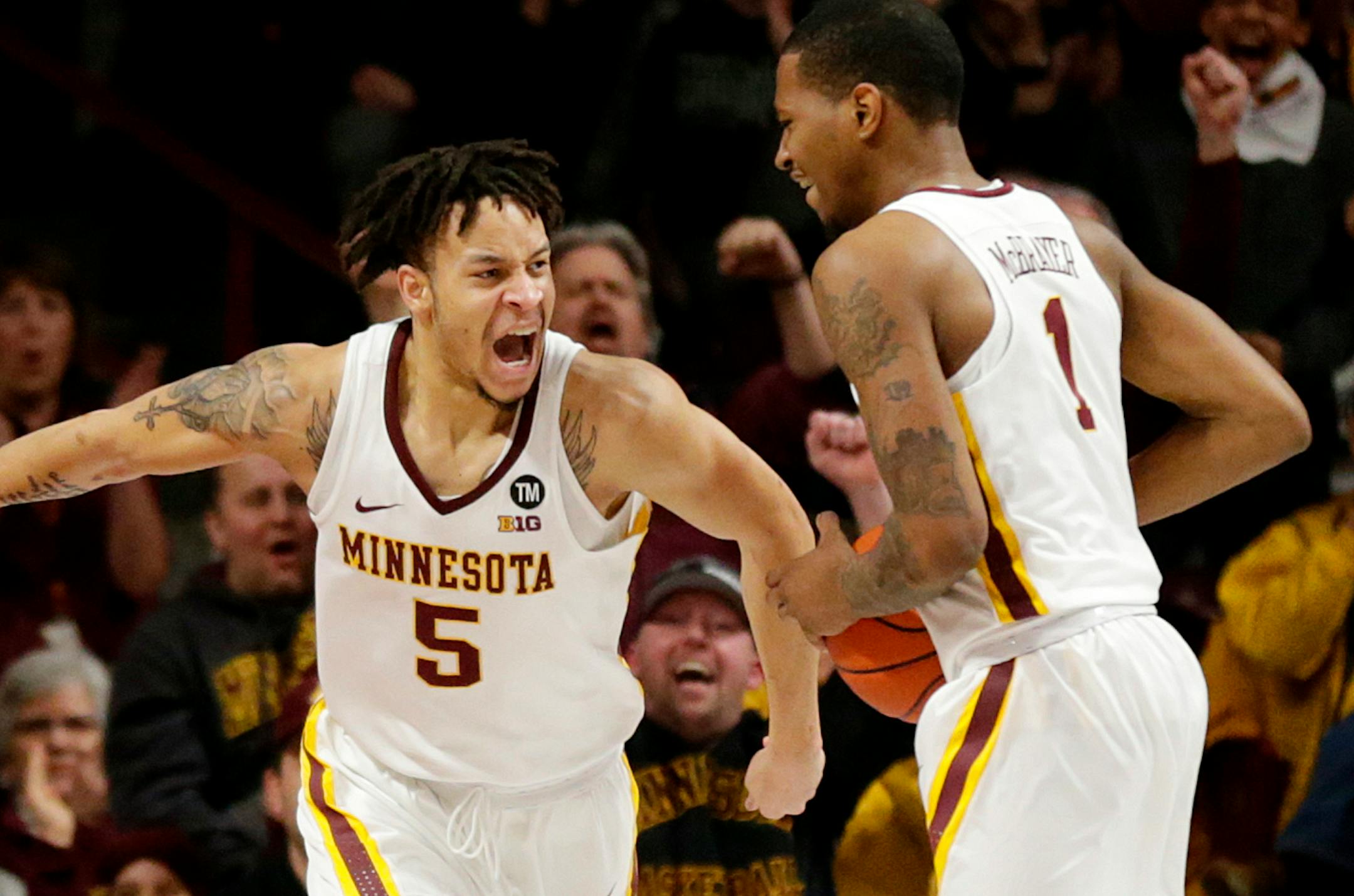 Guards Amir Coffey (5) and Dupree McBrayer are two of the veteran players who are trying to share their 2017 NCAA tournament experience and knowledge with their younger Gophers teammates.