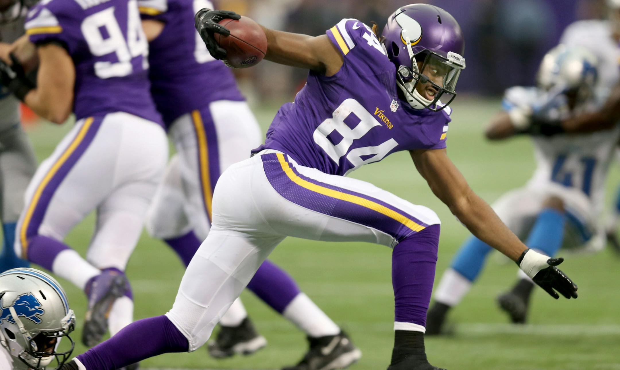 Minnesota Vikings wide receiver Cordarrelle Patterson (84) ran for a punt return as he's held by Detroit Lions linebacker Tahir Whitehead (59) in the fourth quarter as the Vikings took on the Lions at Mall of America Field, Sunday, December 29, 2013 in Minneapolis, MN. (ELIZABETH FLORES/STAR TRIBUNE) ELIZABETH FLORES &#x2022; eflores@startribune.com ORG XMIT: MIN1312291613304949