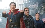 This image released by Marvel Studios shows, from left, Benedict Cumberbatch, Robert Downey Jr., Mark Ruffalo and Benedict Wong in a scene from "Aveng