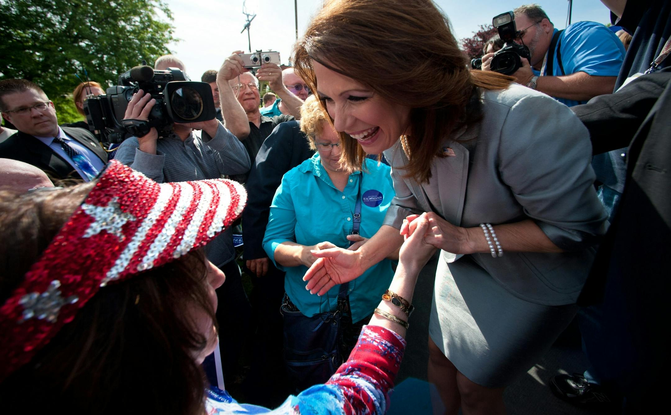 Republican presidential candidate Michele Bachmann officially kicked off a three-state campaign announcement tour in her birth state of Iowa on Monday, June 27, 2011. She signed posters and greeted supporters afterward.