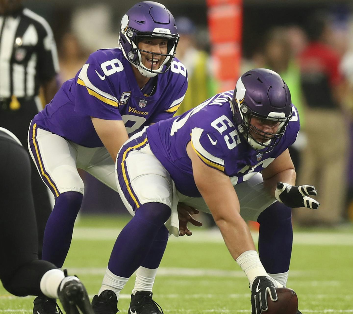 Minnesota Vikings center Pat Elflein (65) prepared to hike the ball to Minnesota Vikings quarterback Sam Bradford.