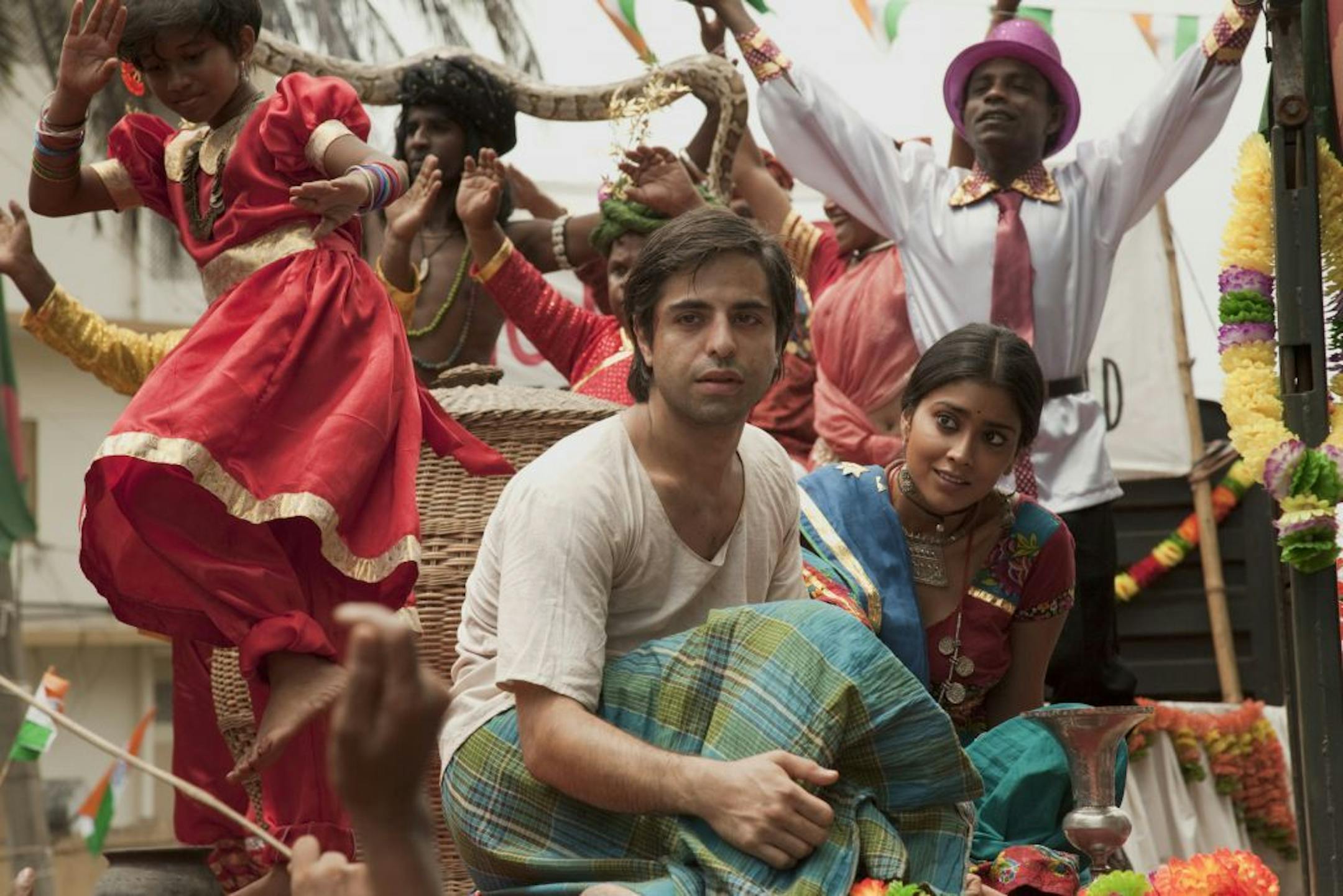 Satya Bhabha and Shriya Saran in "Midnight's Children" in an undated handout photo. Salman Rushdie narrates the film adaptation of his novel, which is directed by Deepa Mehta. (Paladin and 108 Media via The New York Times) -- NO SALES; FOR EDITORIAL USE ONLY WITH STORY SLUGGED CHILDREN-FILM-REVIEW. ALL OTHER USE PROHIBITED. -- ORG XMIT: MIN2013060314323445