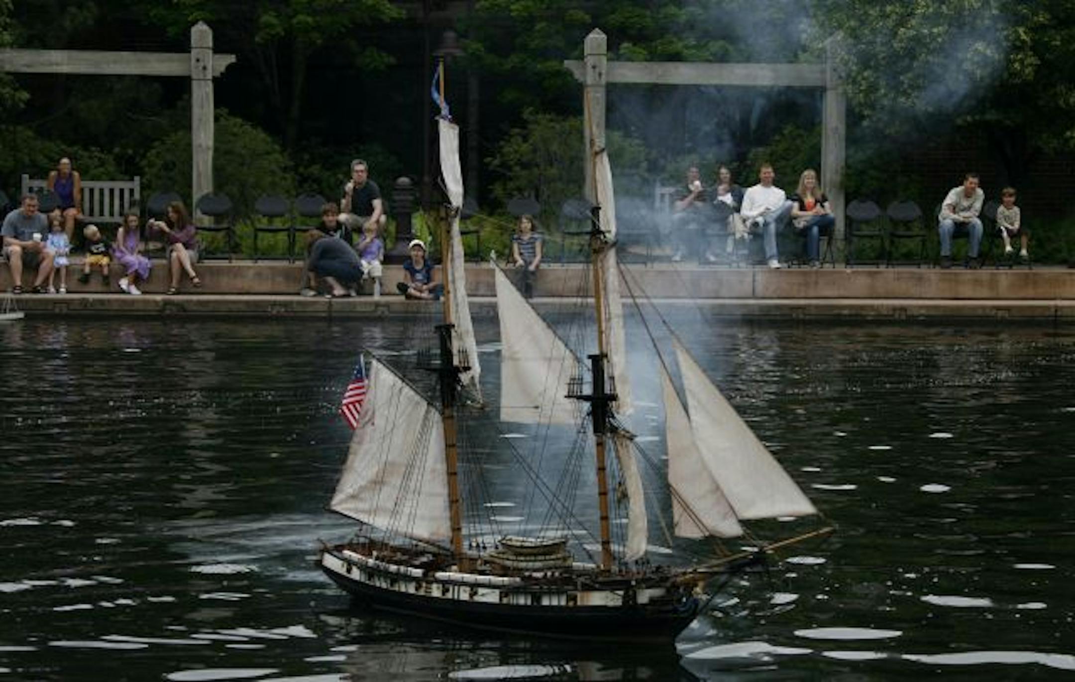 Smoke from cannons on an 1803 brig ship entertained the crowd at Centennial Lakes Park. Owner Dan Lewandoski said the original ship fought Barbary pirates off the shores of Tripoli, Lebanon.