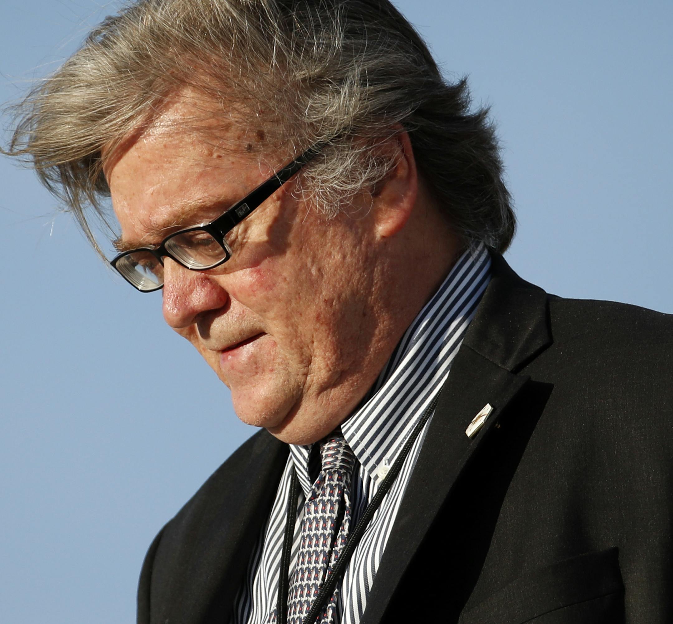 White House chief strategist Steve Bannon steps off Air Force One as he arrives Sunday, April 9, 2017, at Andrews Air Force Base, Md. Bannon was with President Donald Trump on his return trip from Florida. (AP Photo/Alex Brandon)