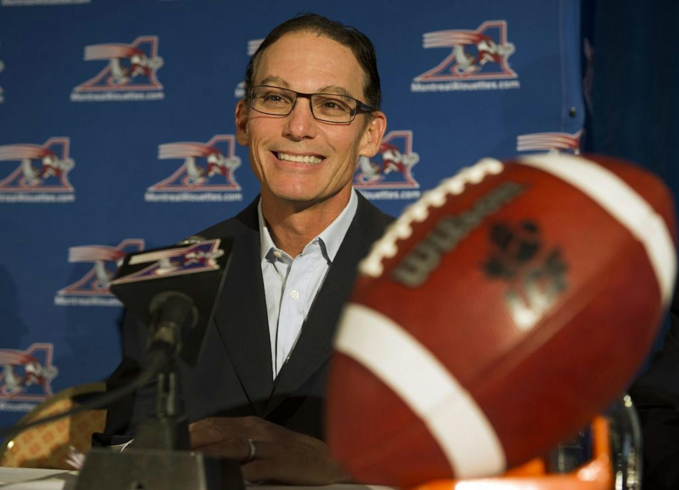 In this July 16, 2012 file photo, Montreal Alouettes head coach Marc Trestman speaks to reporters at a news conference in Montreal.