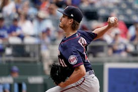 Minnesota Twins starting pitcher Joe Ryan throws during the sixth inning of a baseball game against the Kansas City Royals Thursday, April 21, 2022, i