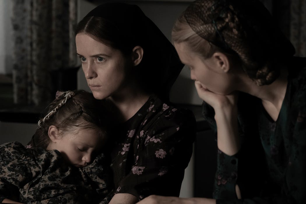 From left, Emily Mitchell, Claire Foy and Rooney Mara in a scene from “Women Talking.”
