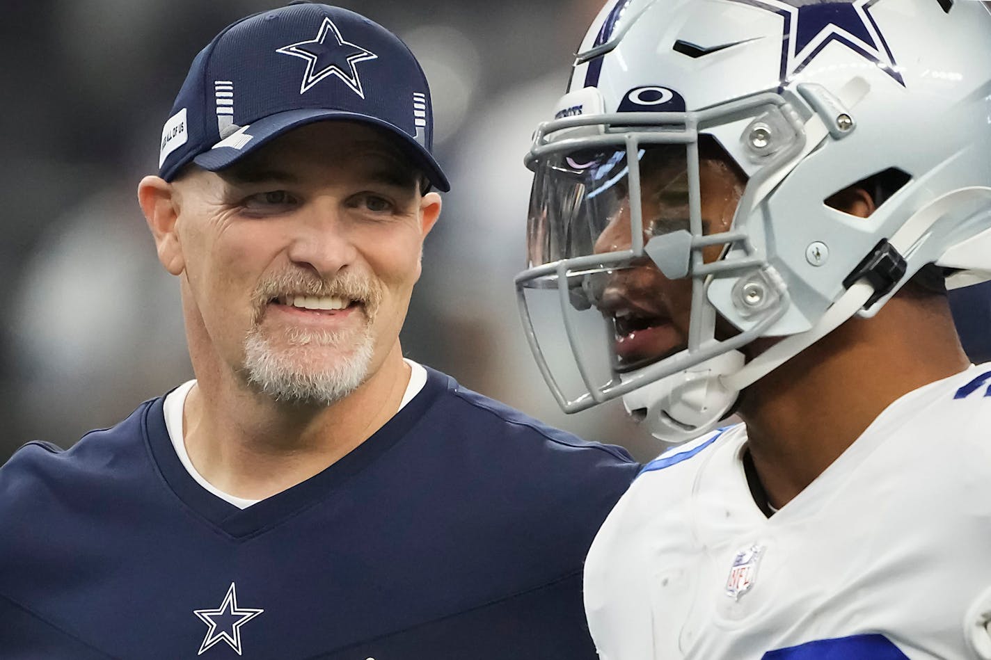 Dallas Cowboys defensive coordinator Dan Quinn talks with running back Tony Pollard as the team warms up before a game against the Atlanta Falcons at AT&amp;T Stadium on Sunday, Nov. 14, 2021, in Arlington, Texas. (Smiley N. Pool/The Dallas Morning News/TNS) ORG XMIT: 37772307W