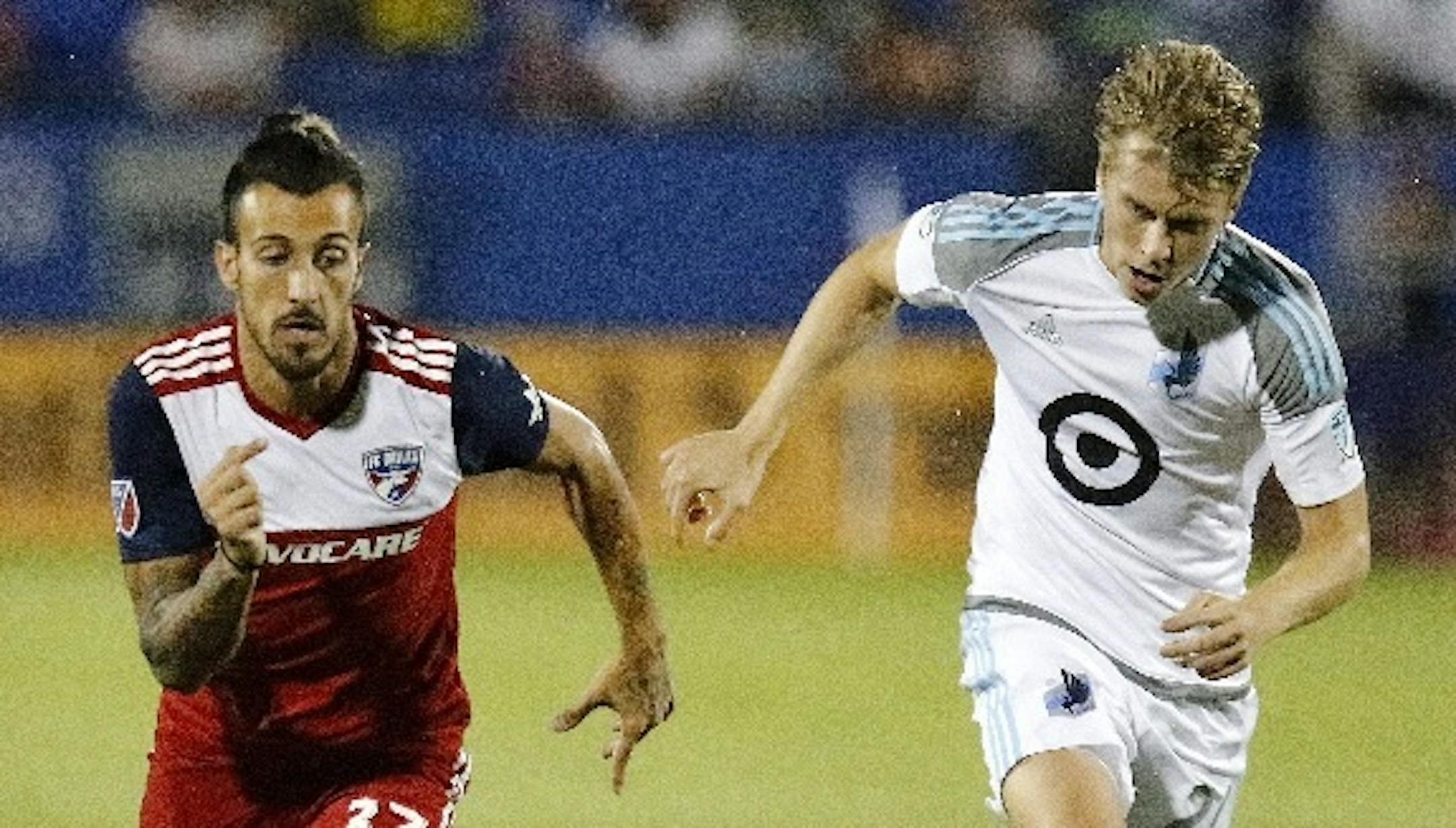 FC Dallas forward Maximiliano Urruti, left, got past Minnesota United midfielder Rasmus Schuller during the first half of an MLS soccer match in Frisco, Texas, on Saturday. FC Dallas won 2-0.