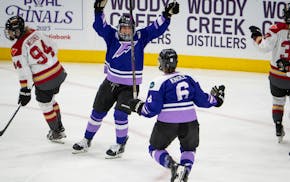 Frost forward Katy Knoll (6) leaps to celebrate after scoring the winning goal in the third overtime Saturday at Xcel Energy Center.